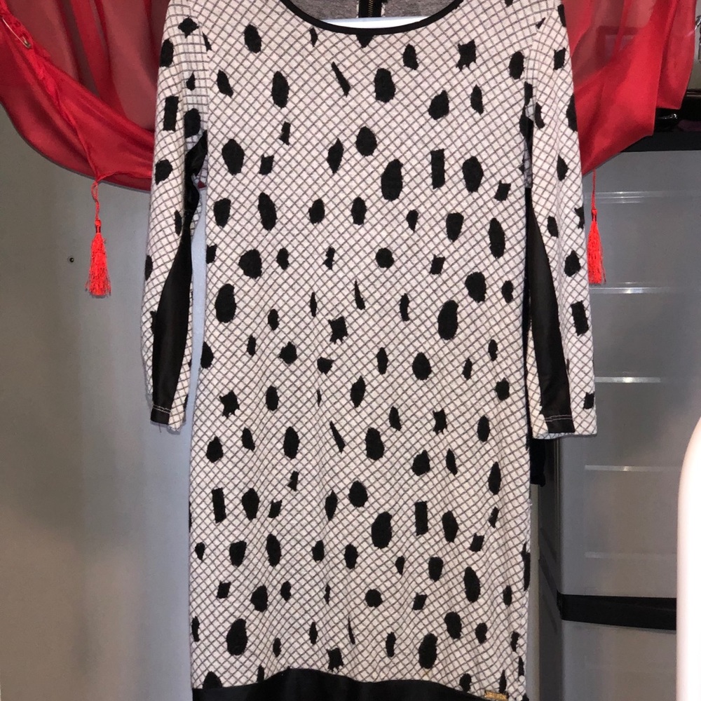 Women dress with faux leather details.